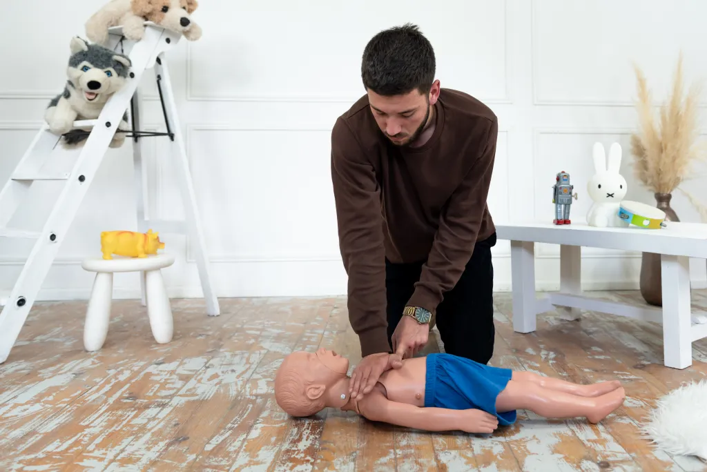 Formation SST avec mannequin sur le sol